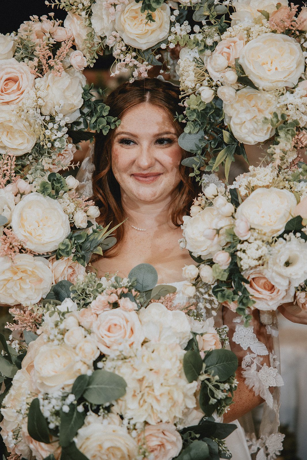 Bride holding her greenery bouquet