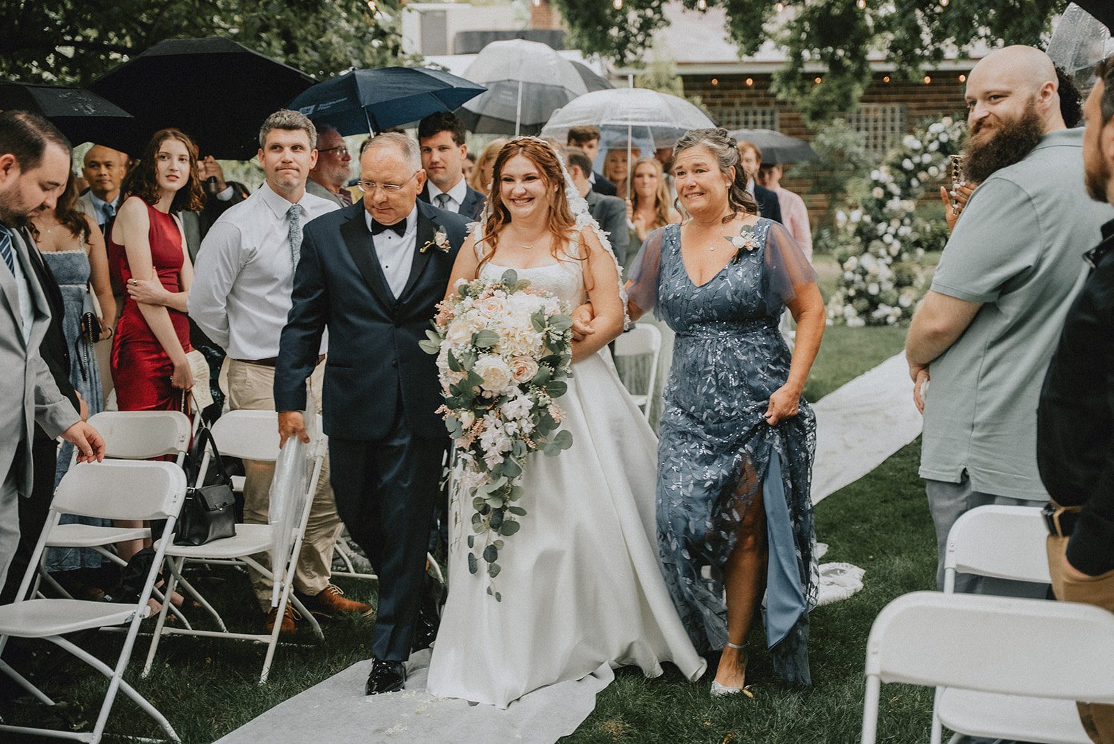 Bride walking down the aisle with her father