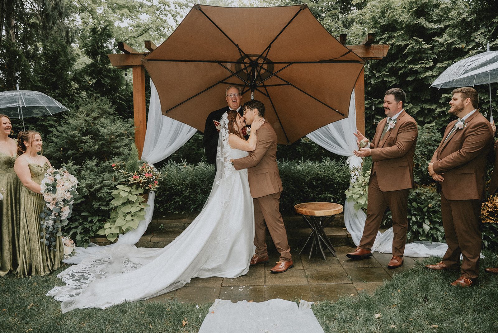 Bride and groom exchanging vows in the garden at The Z Hall