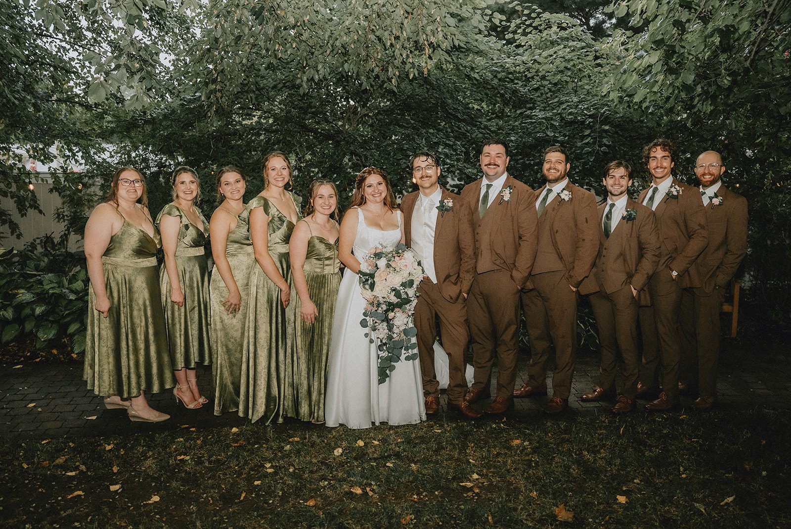 Full wedding party in the garden at The Z Hall