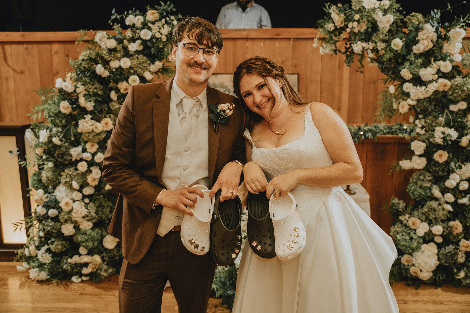 Couple sharing a sweet reception moment