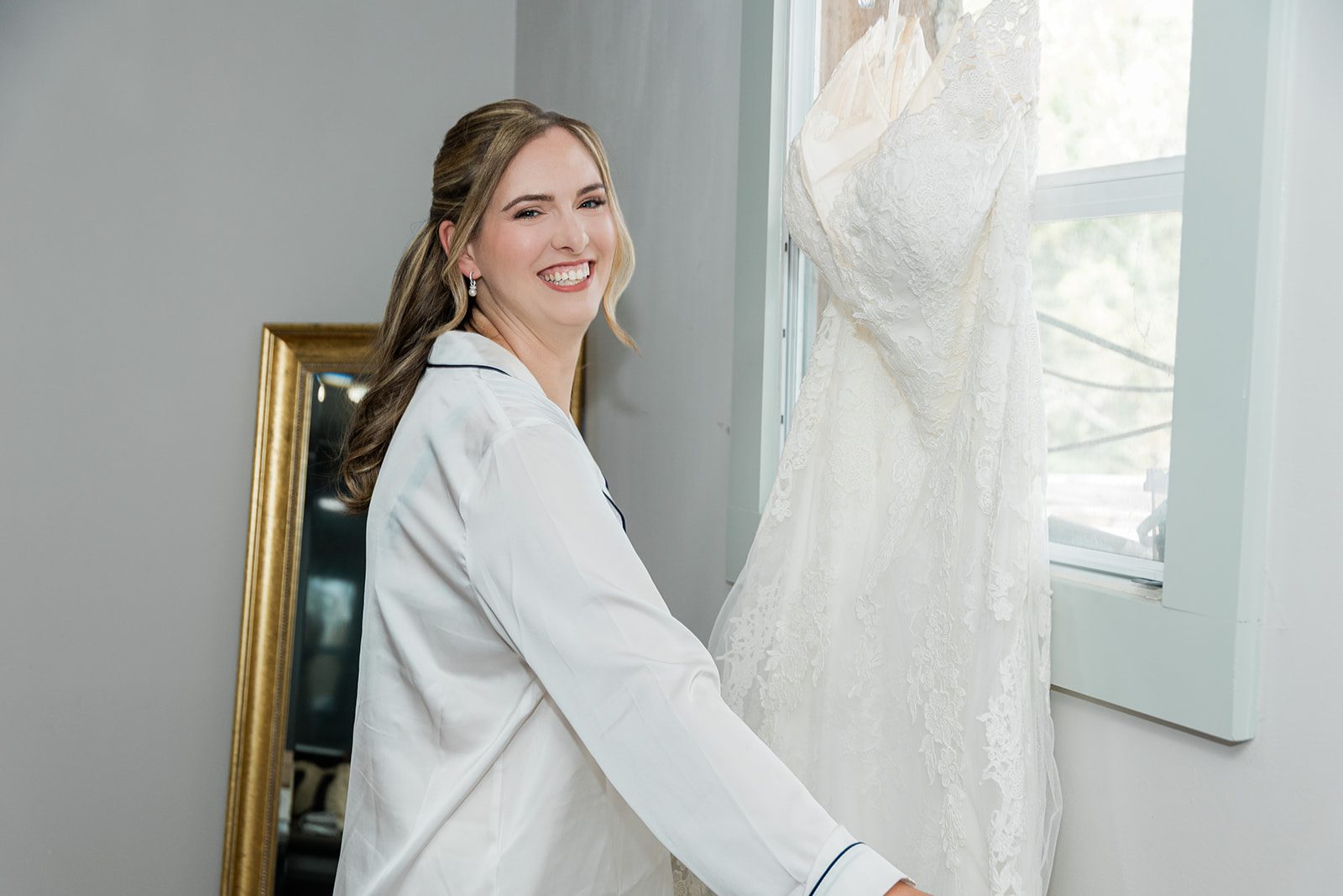 Bride getting ready in her robe Bride getting ready in her robe