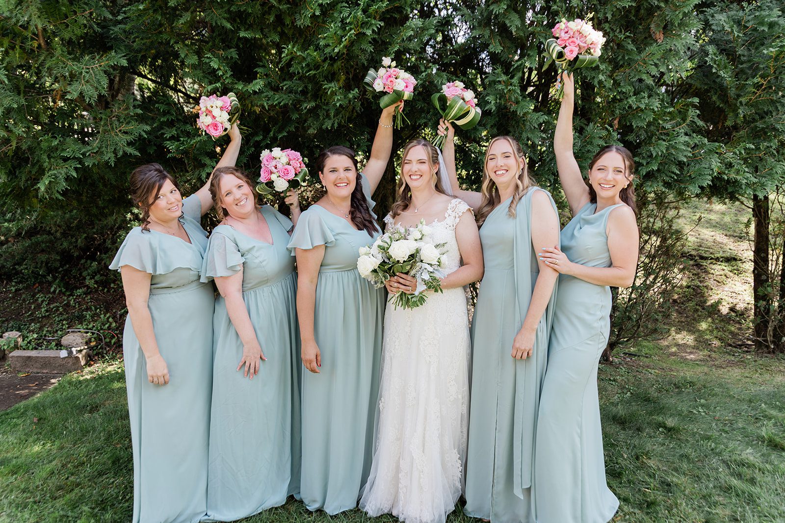 Bride with her bridesmaids in the garden at Travelers Rest Bride with her bridesmaids in the garden at Travelers Rest