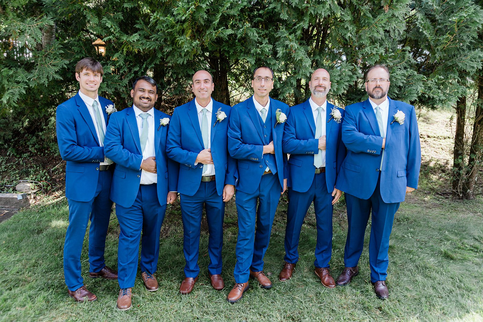Groom and groomsmen in the garden at Travelers Rest Groom and groomsmen in the garden at Travelers Rest