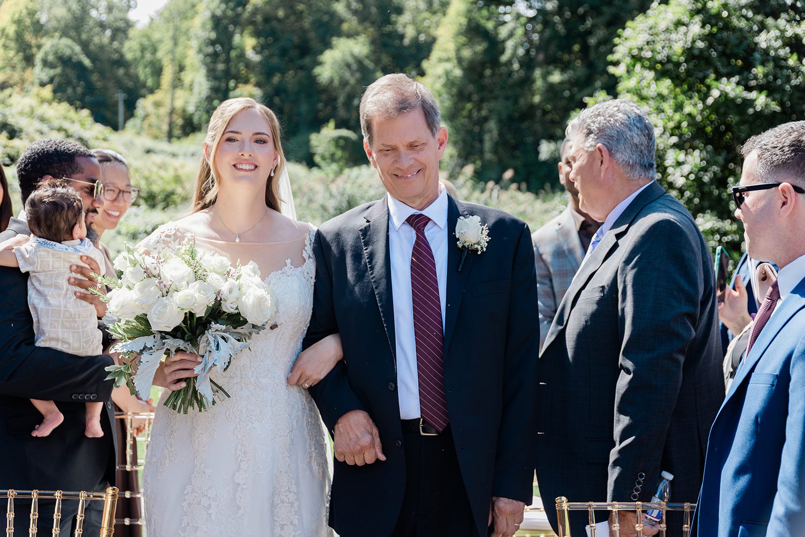 Bride walking down the aisle with her father Bride walking down the aisle with her father