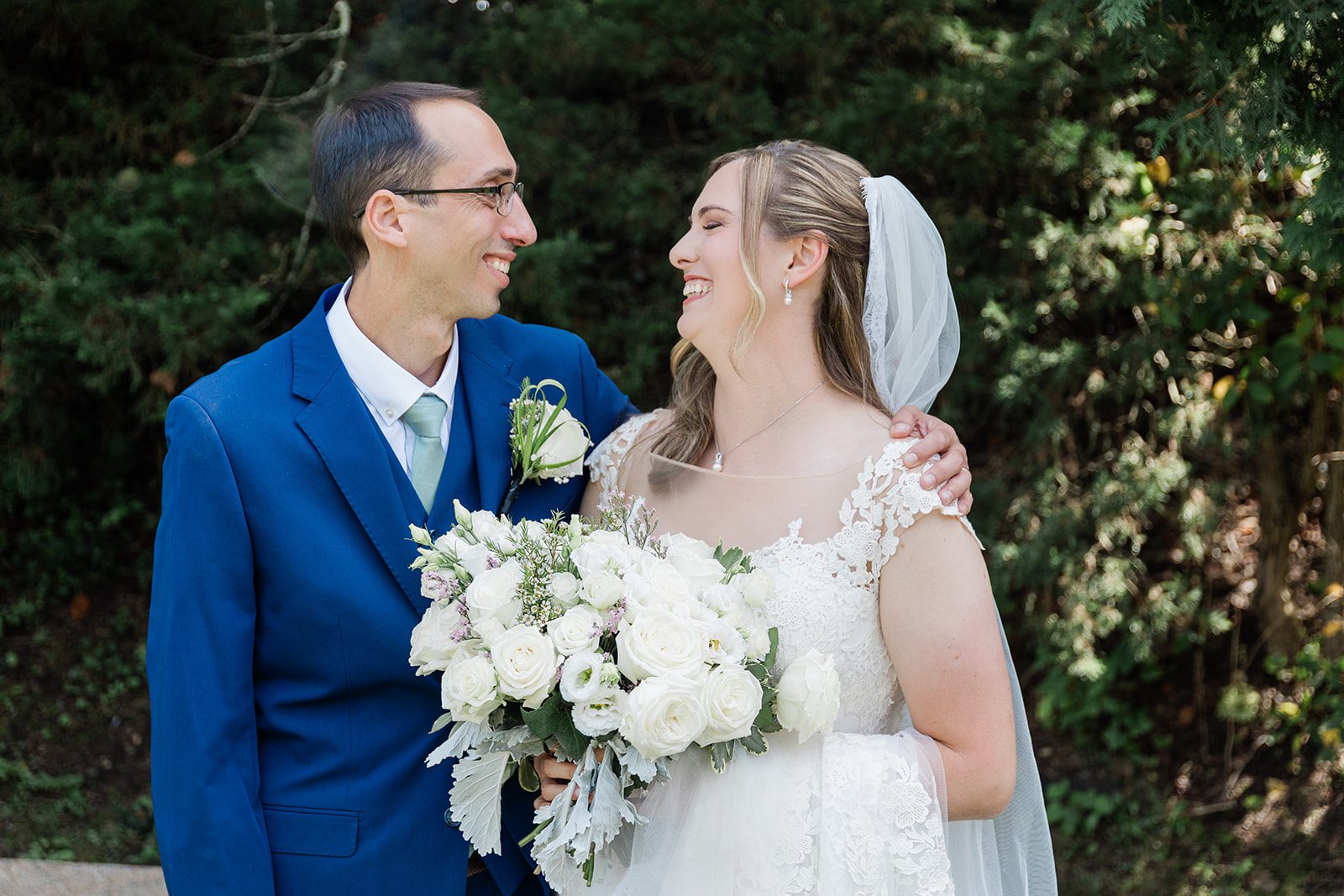 Bride and groom smiling together Bride and groom smiling together