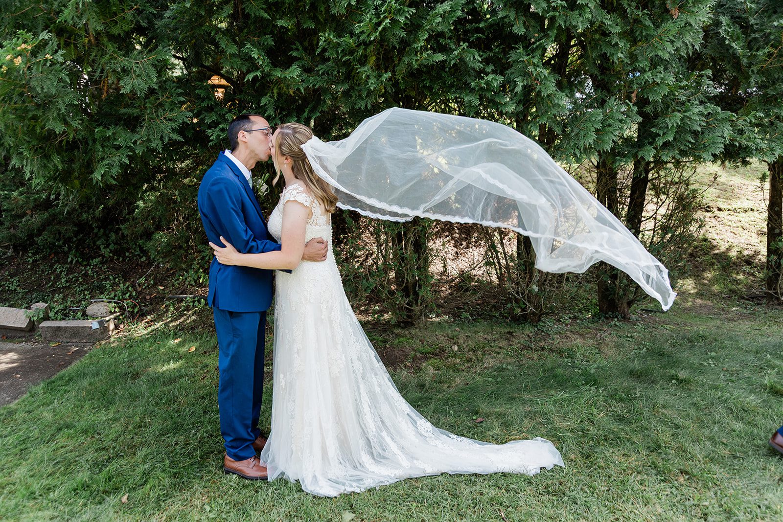 Groom kissing the bride under her veil Groom kissing the bride under her veil