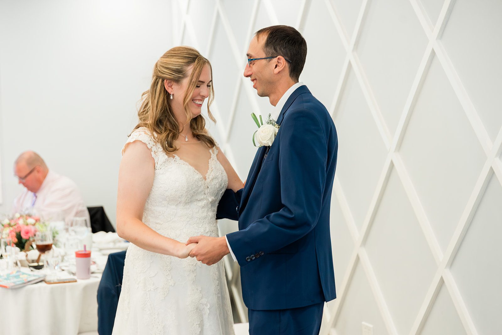Couple smiling at the cake table Couple smiling at the cake table