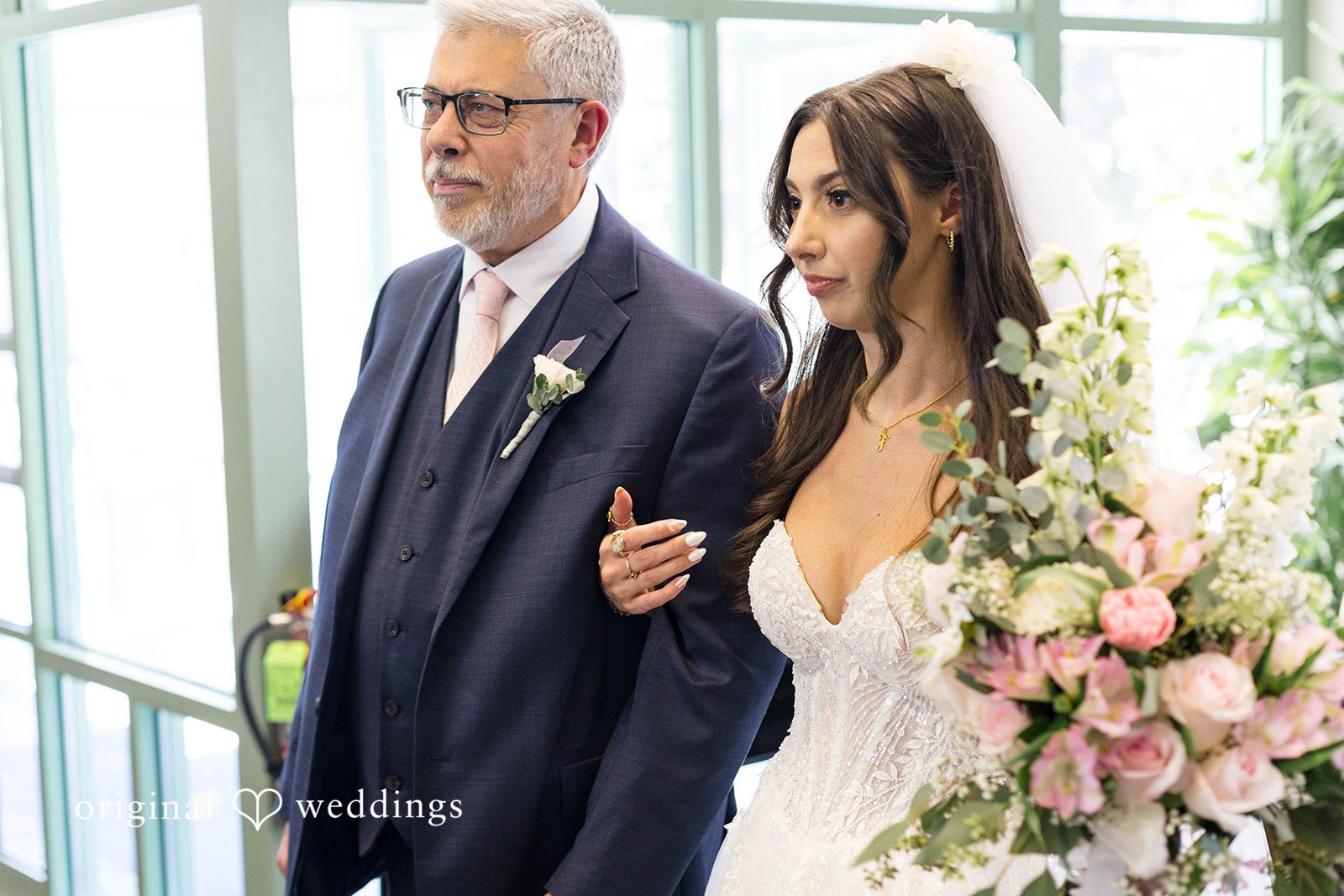 Father walking the bride down the aisle
