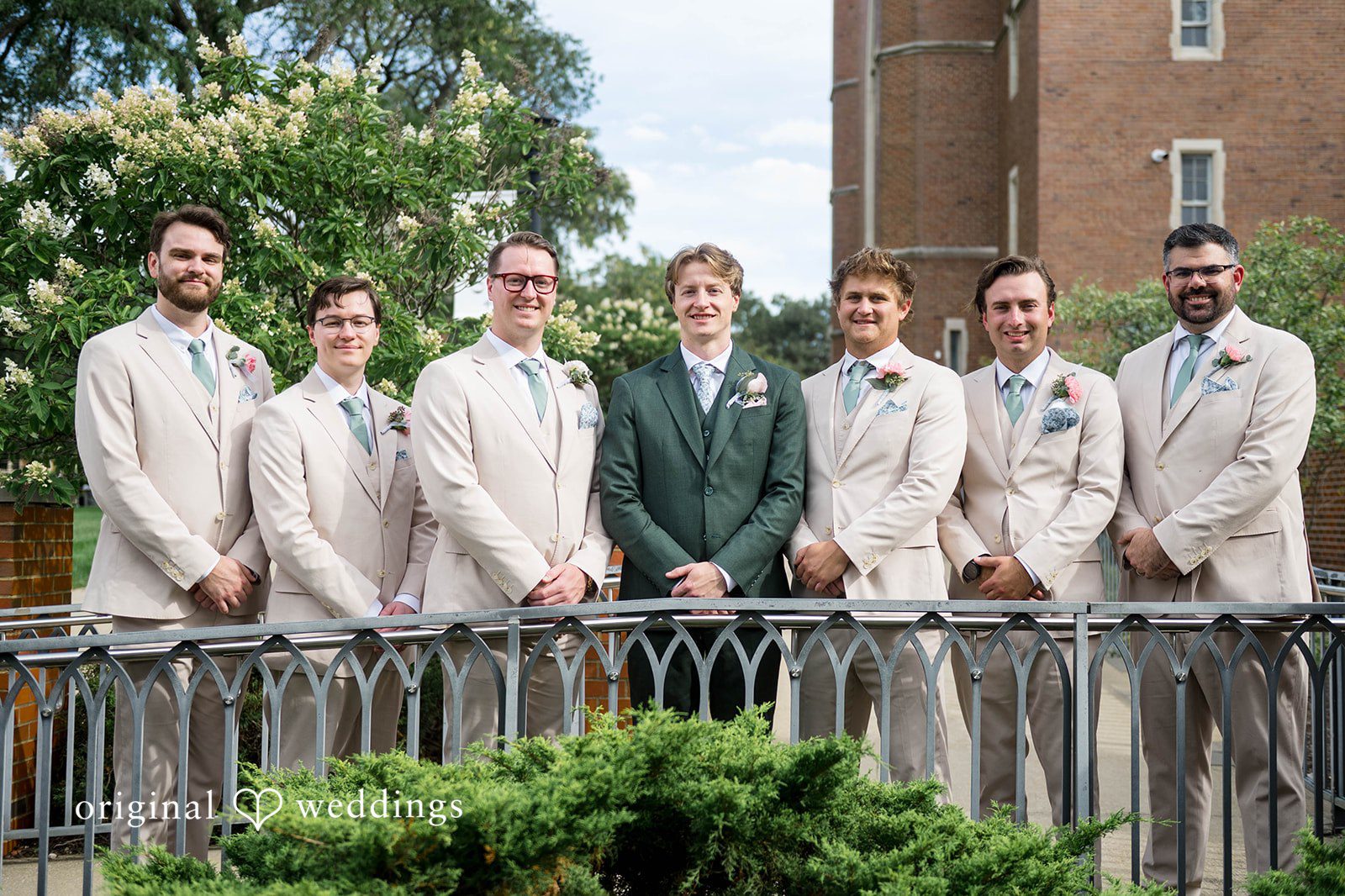 Groom with his groomsmen on a balcony