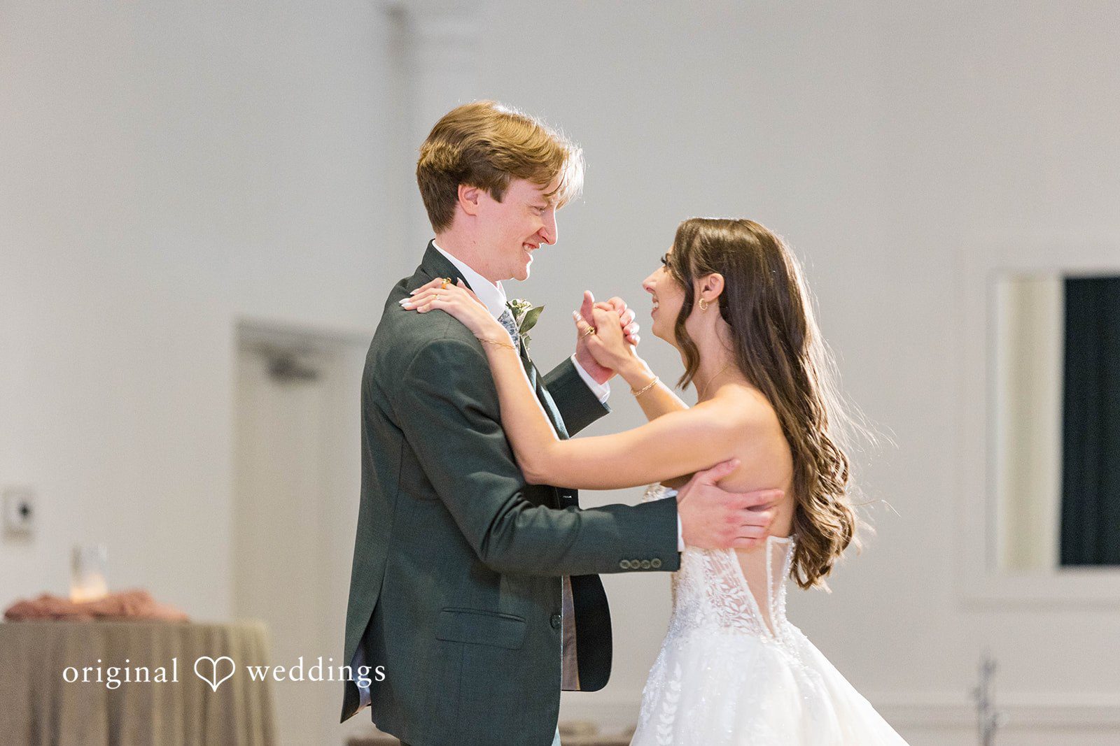 Bride and groom dancing together