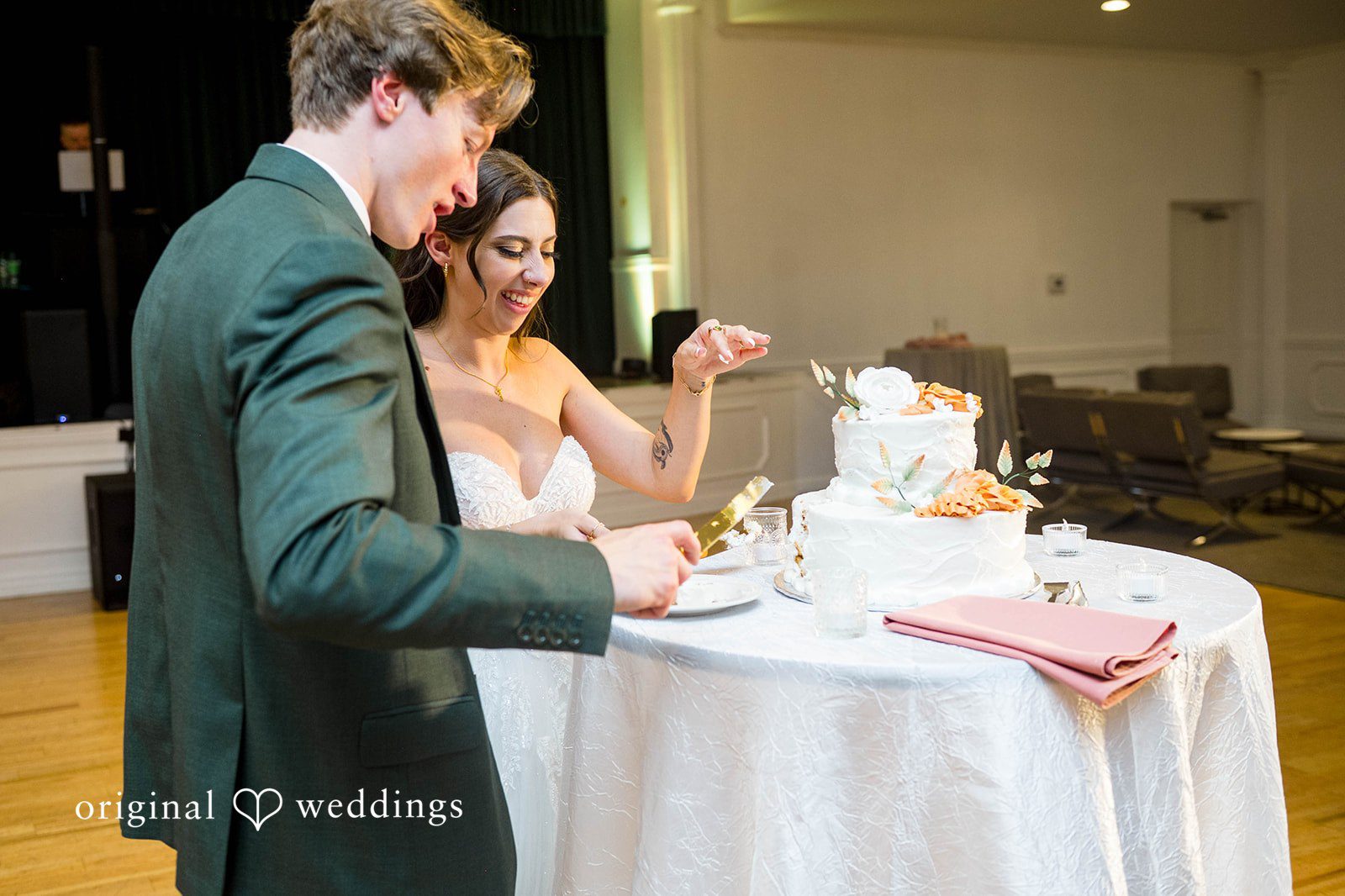 Couple sharing a taste of cake