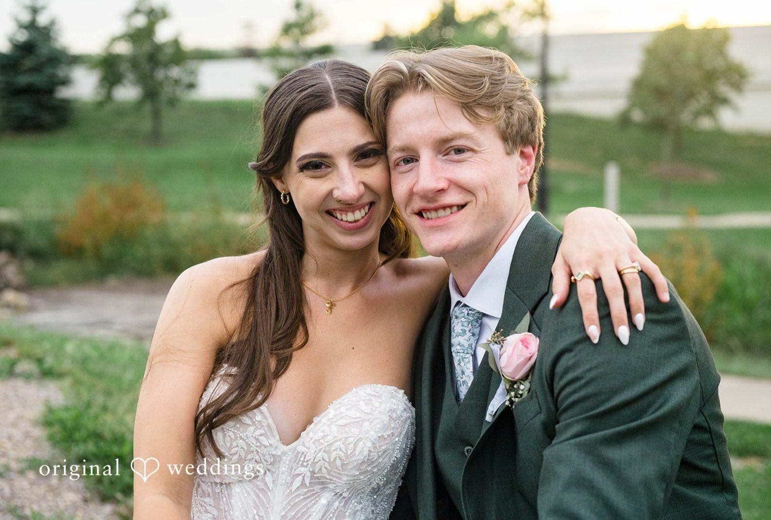Bride and groom smiling together outdoors, captured by Cleveland wedding photographers from Original Weddings at Tremont Cityside Ballroom