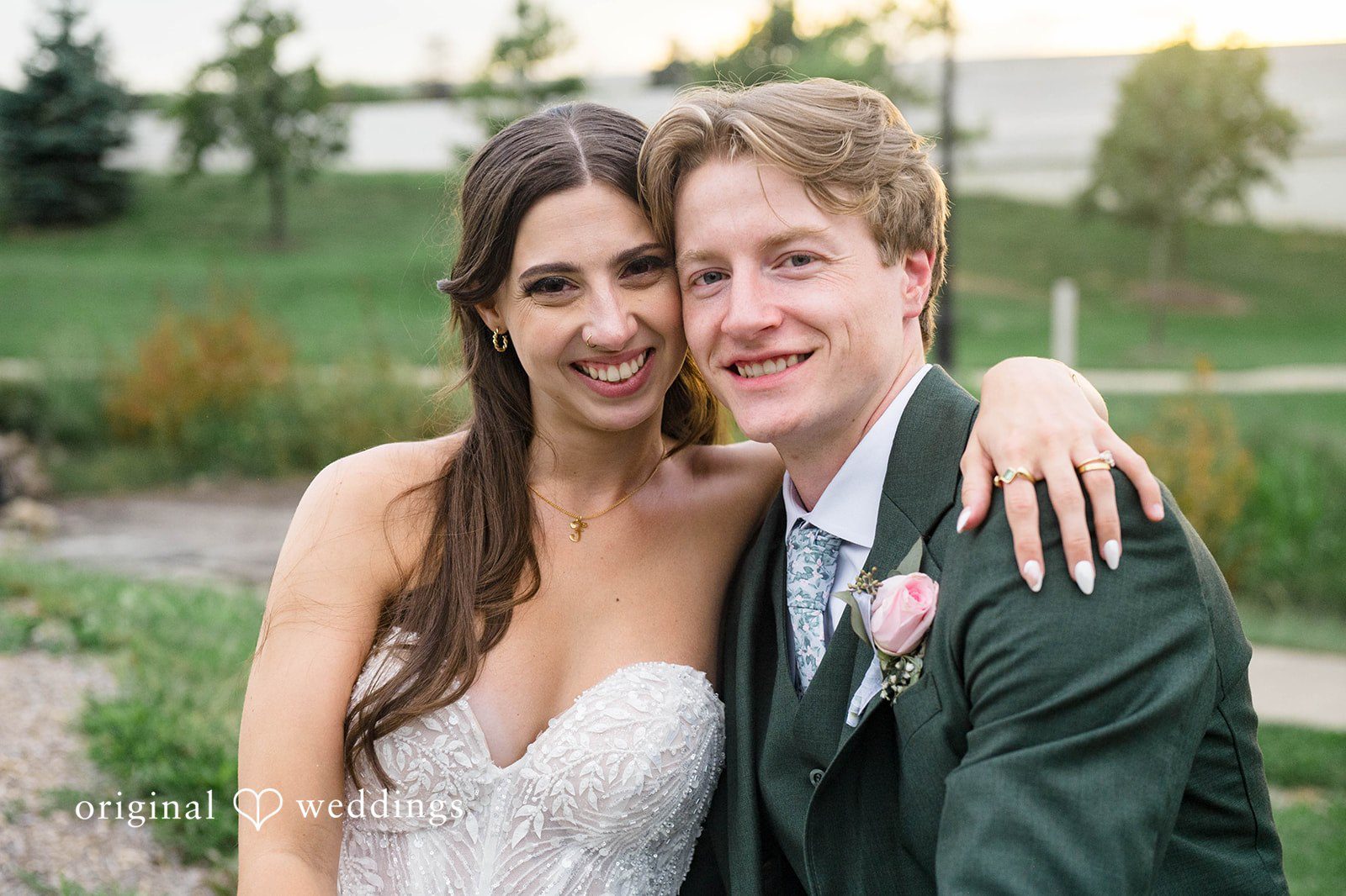 Bride and groom smiling together outdoors, captured by Cleveland wedding photographers from Original Weddings at Tremont Cityside Ballroom