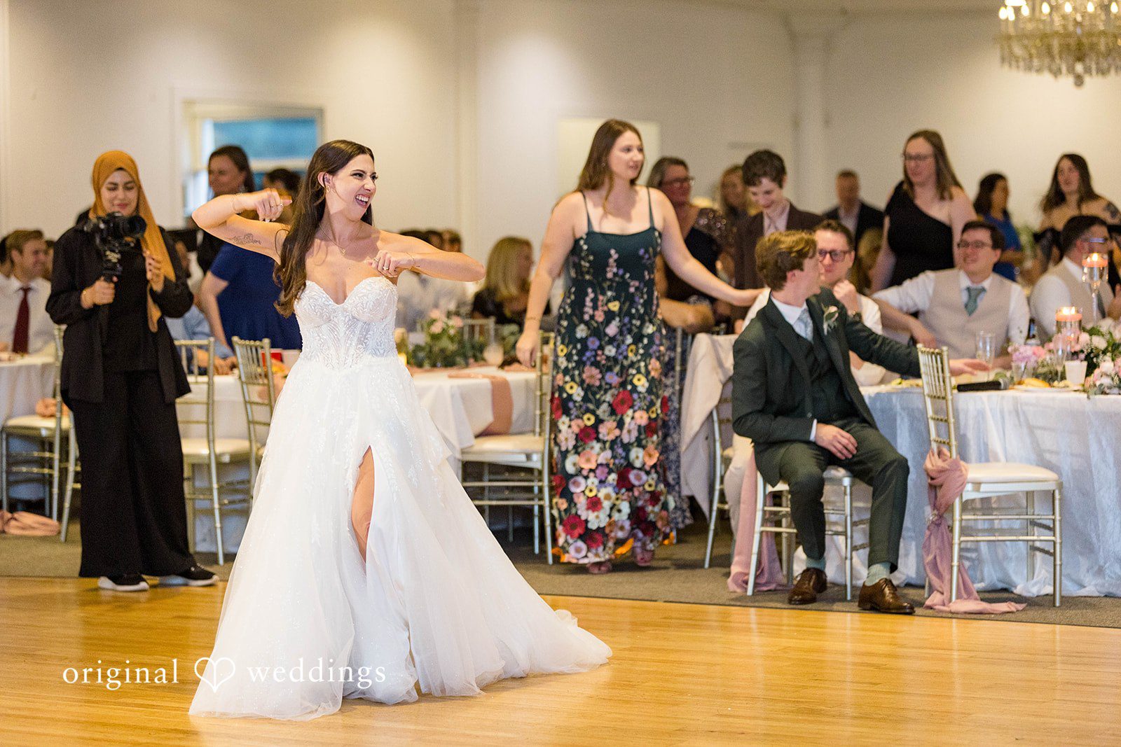 Bride greeting guests at the reception at Tremont Cityside Ballroom
