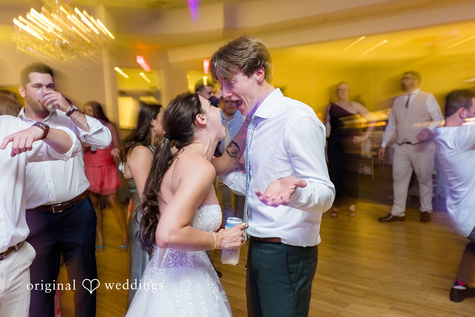 Bride dancing with guests at Tremont Cityside Ballroom
