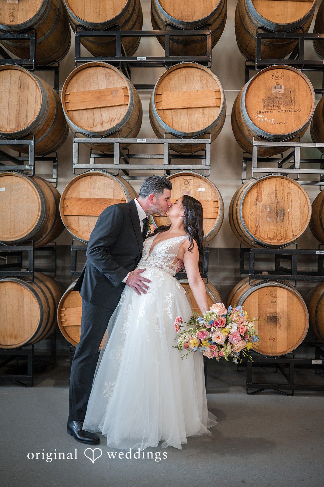 The couple shares a romantic kiss