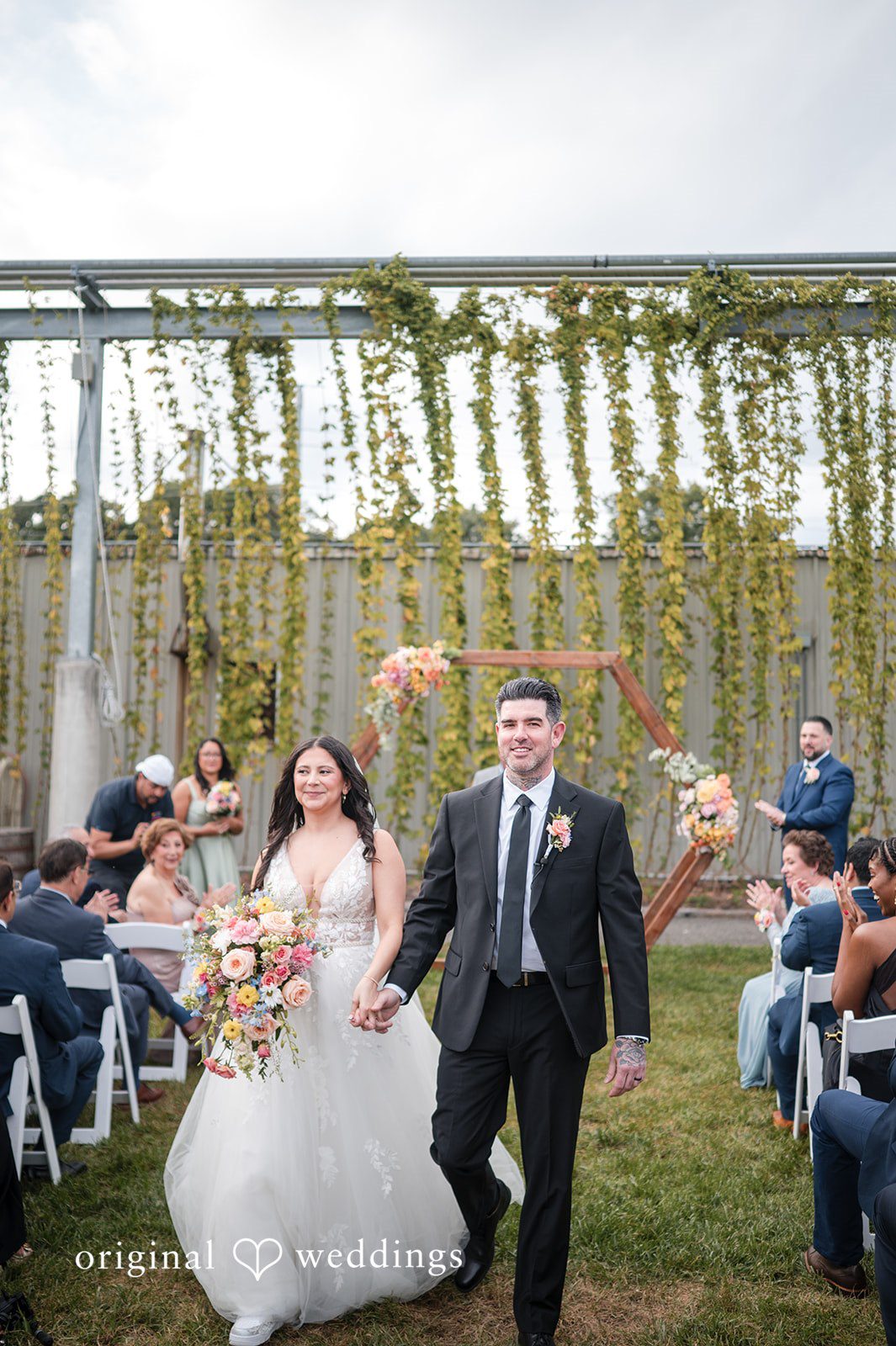 The couple makes a happy exit