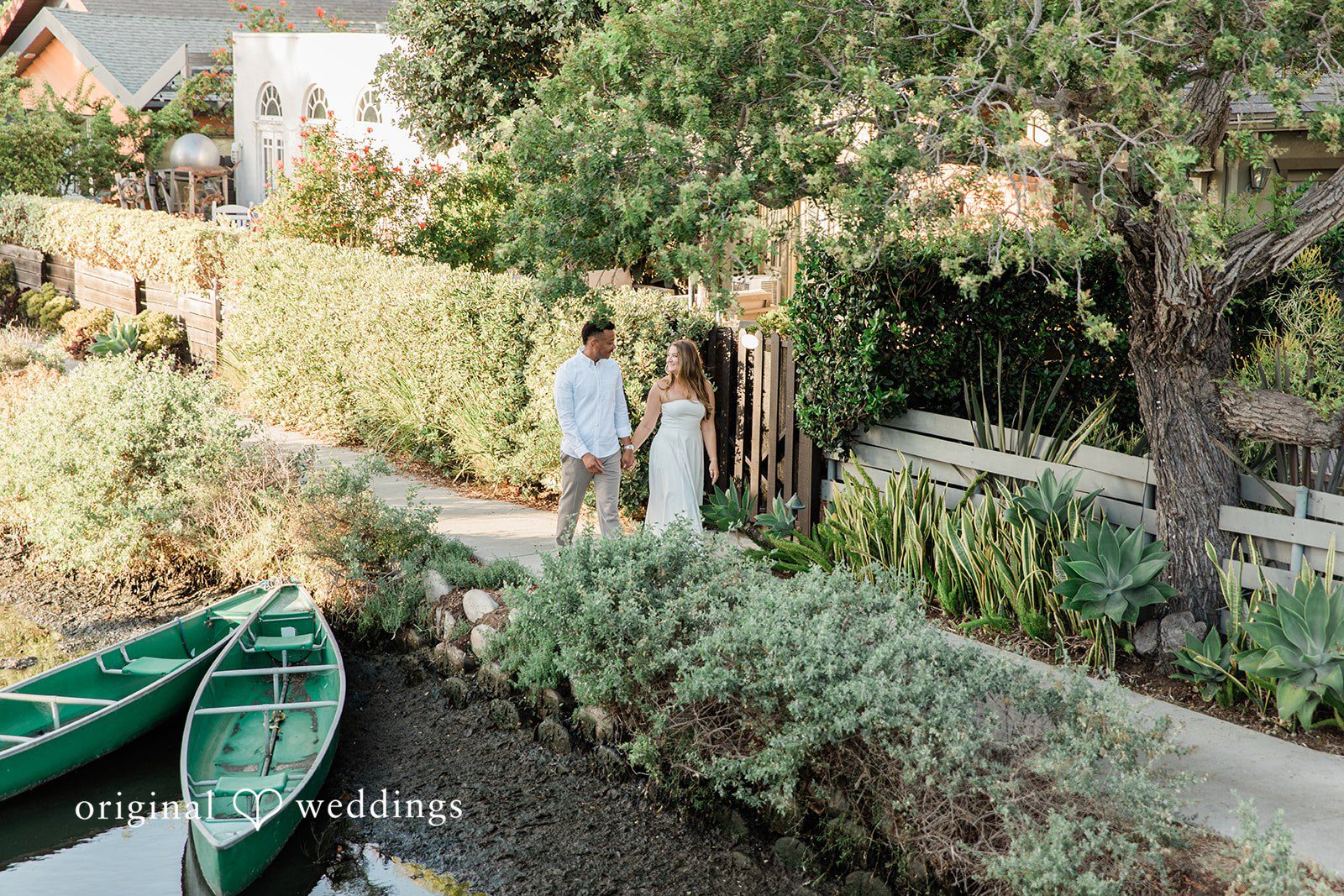 Christine + David Christine and David among canal side gardens and rowboats at Venice Canals