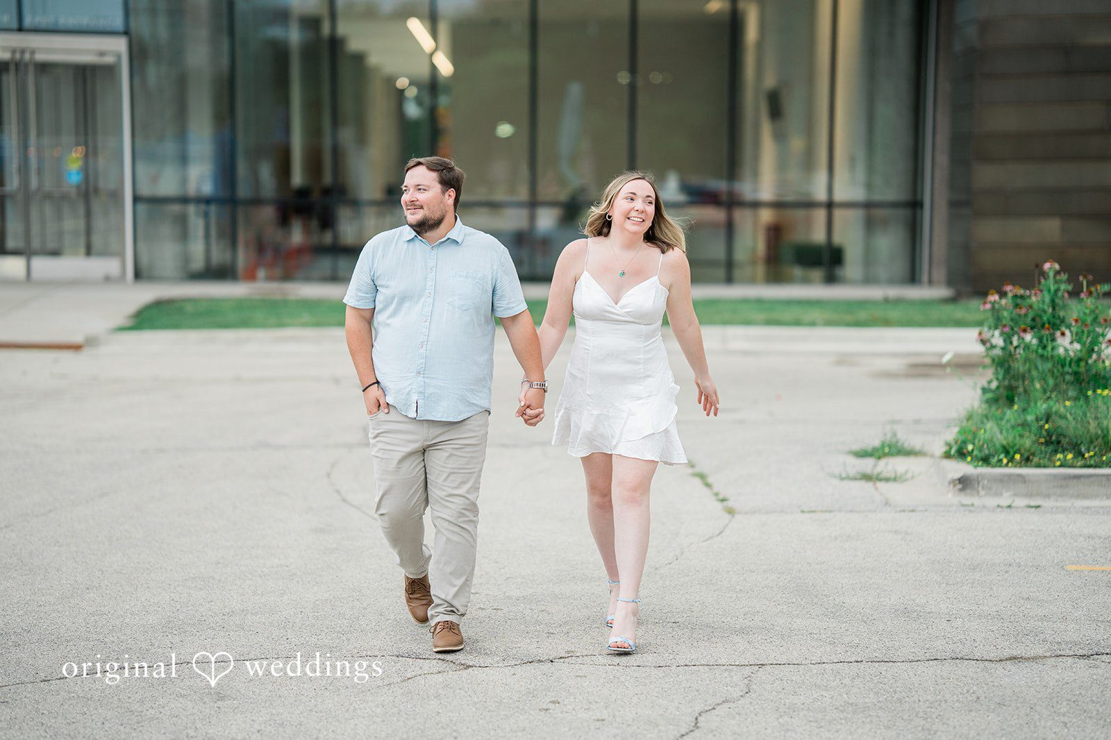 Milwaukee wedding photographers capturing a couple’s wedding portraits at Veterans Park and Atwater Beach along Lake Michigan.