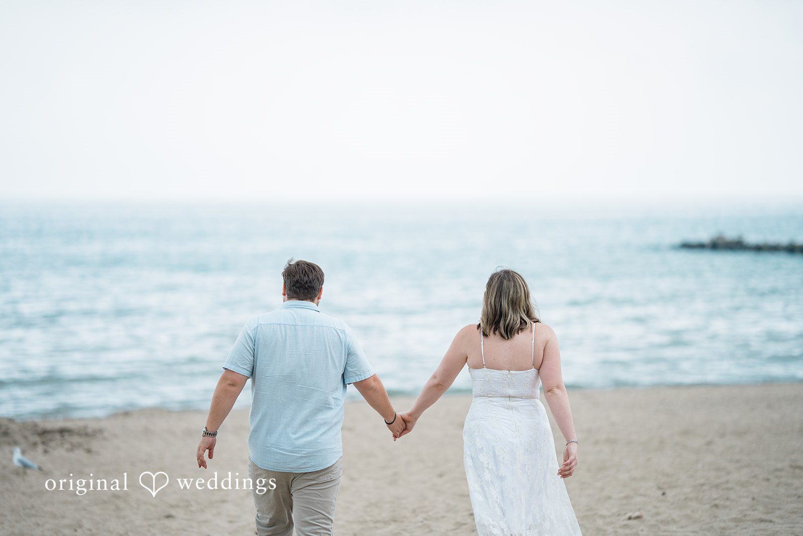 Maggie + Harrison Veterans Park and Atwater Beach Engagement | Maggie & Harrison -