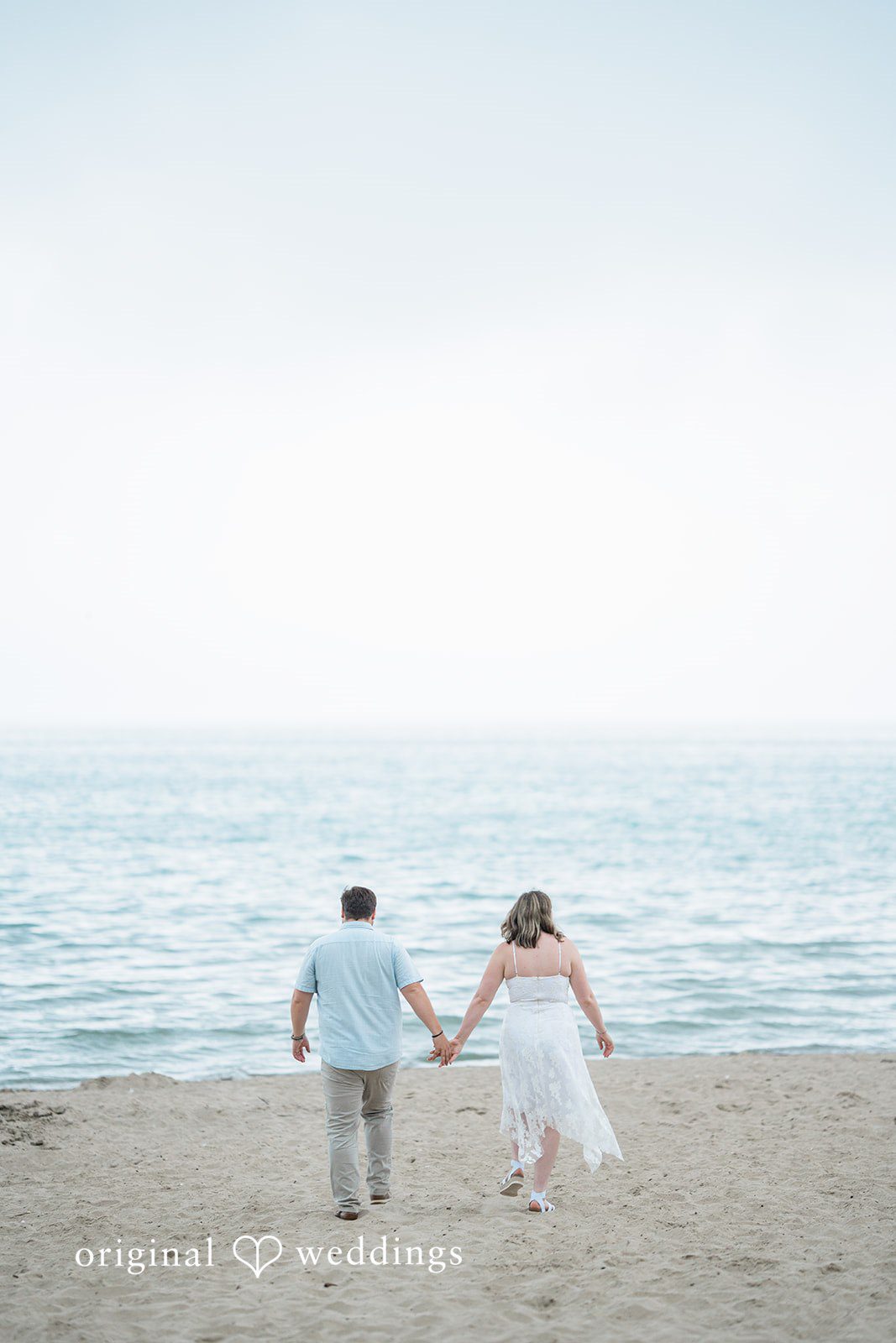 Maggie + Harrison Veterans Park and Atwater Beach Engagement | Maggie & Harrison -