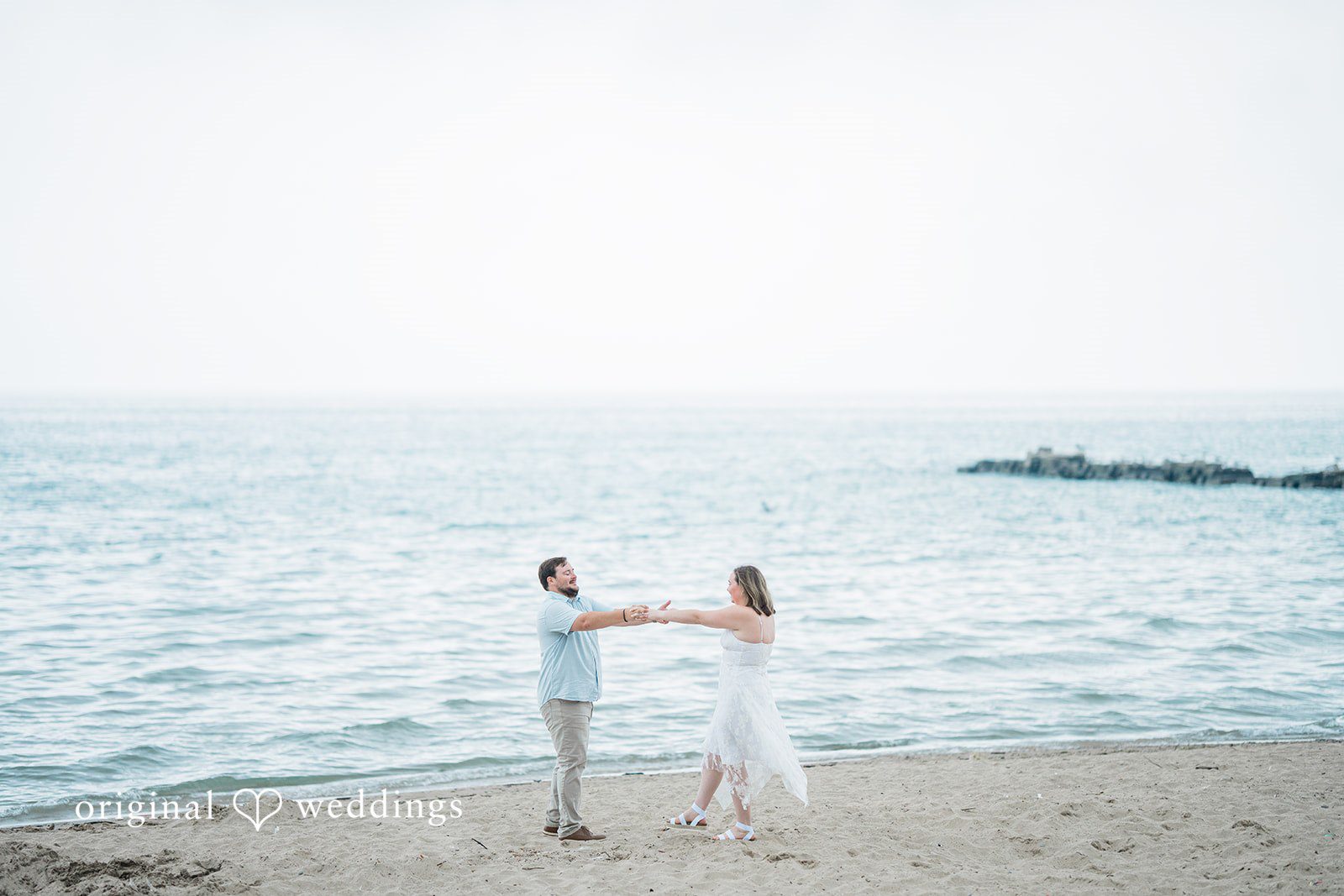 Maggie + Harrison Veterans Park and Atwater Beach Engagement | Maggie & Harrison -