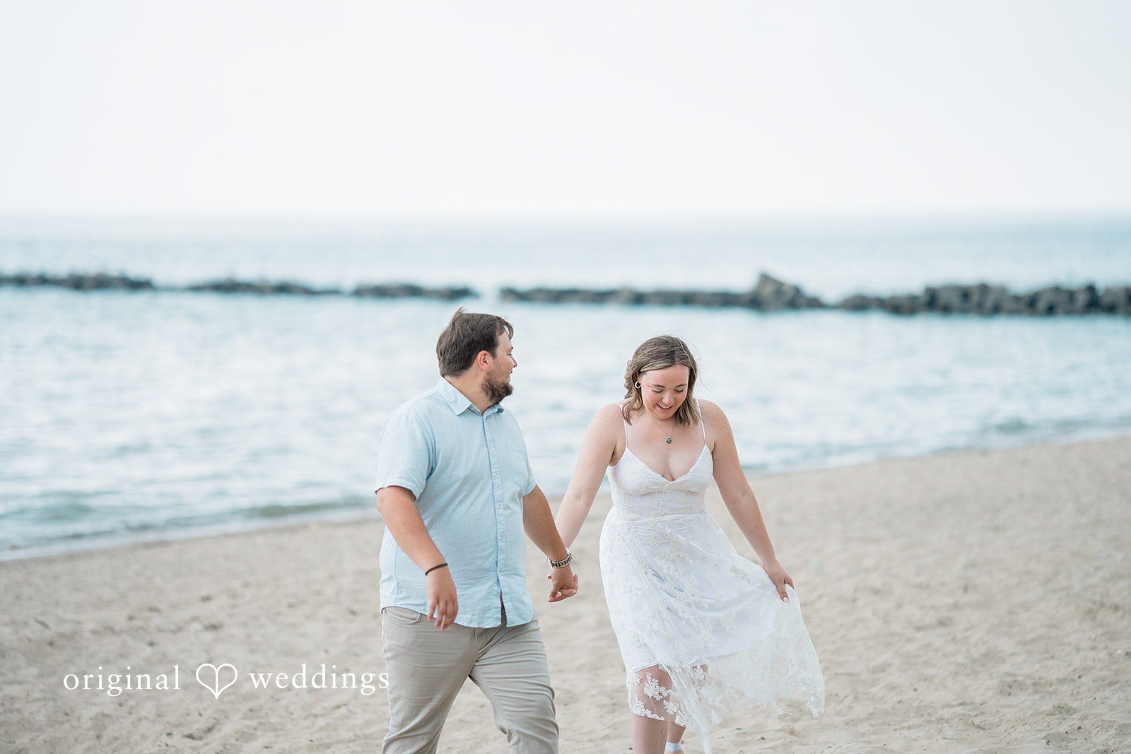 Maggie + Harrison Veterans Park and Atwater Beach Engagement | Maggie & Harrison -