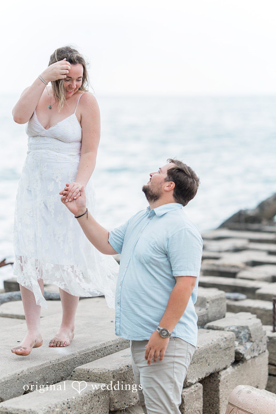 Maggie + Harrison Veterans Park and Atwater Beach Engagement | Maggie & Harrison -