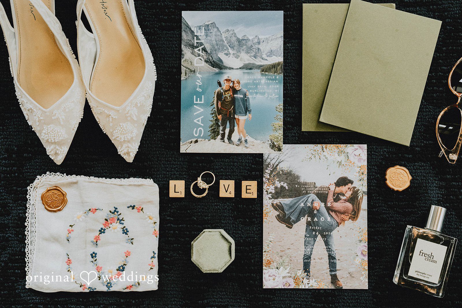 Grace + Andre Bridal details with shoes, invitation and perfume in a flat lay