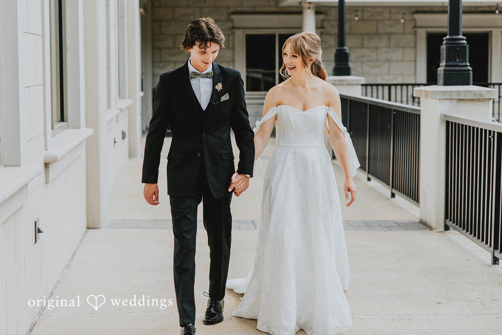Grace + Andre Bride and groom walking together on the terrace