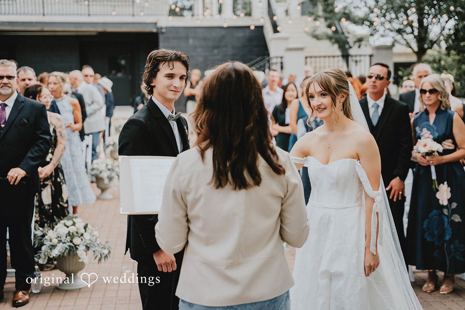 Grace + Andre Bride hugging wedding guests during the celebration