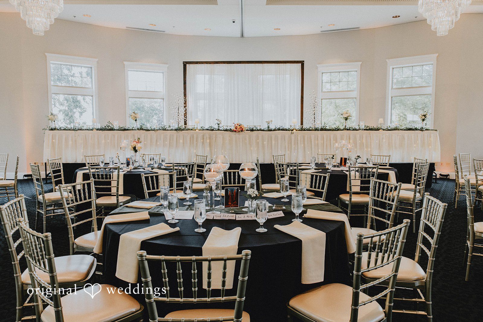 Grace + Andre Reception tables decorated and ready for guests at Veterans Terrace