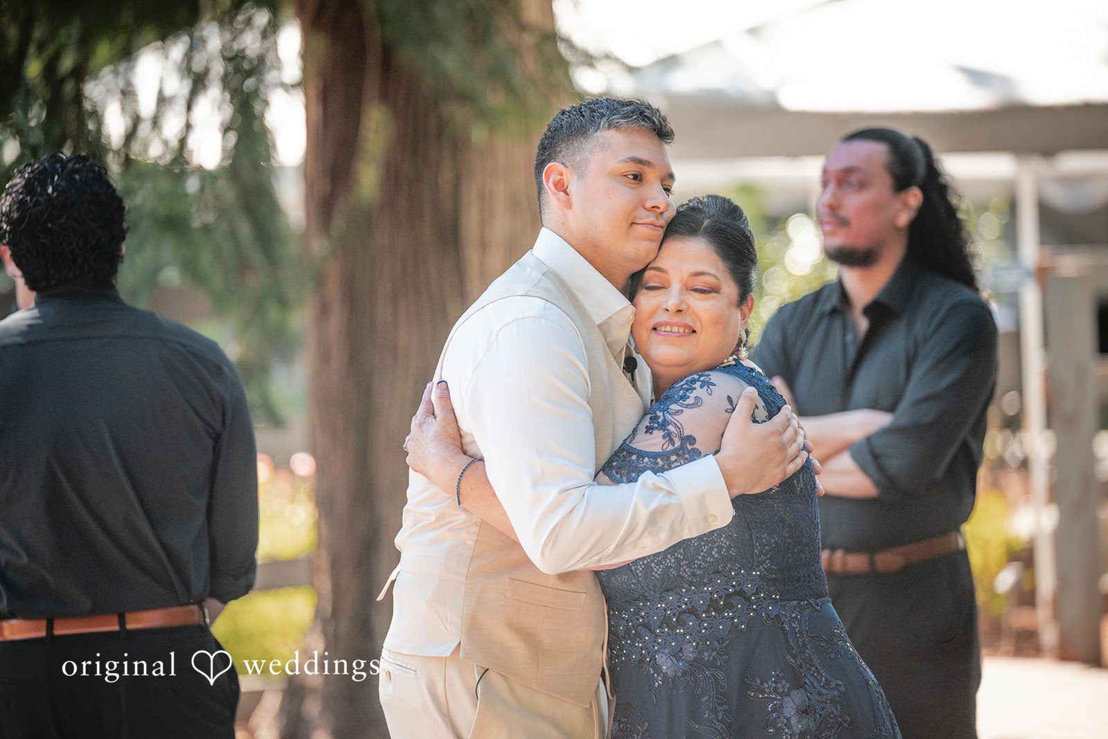 Kylie + Reymundo Groom sharing a hug before the ceremony