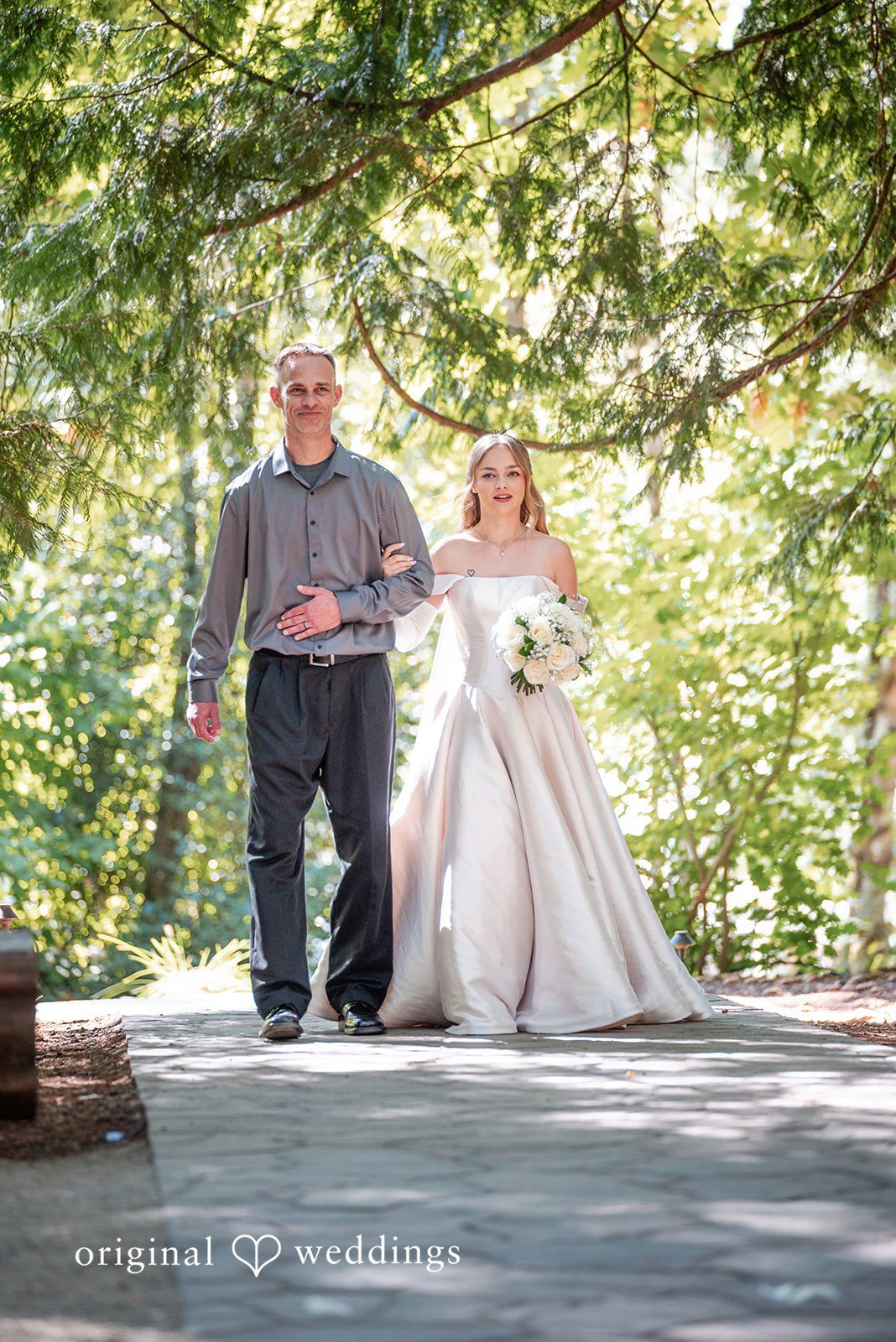 Kylie + Reymundo Bride walking down the forest path to the ceremony