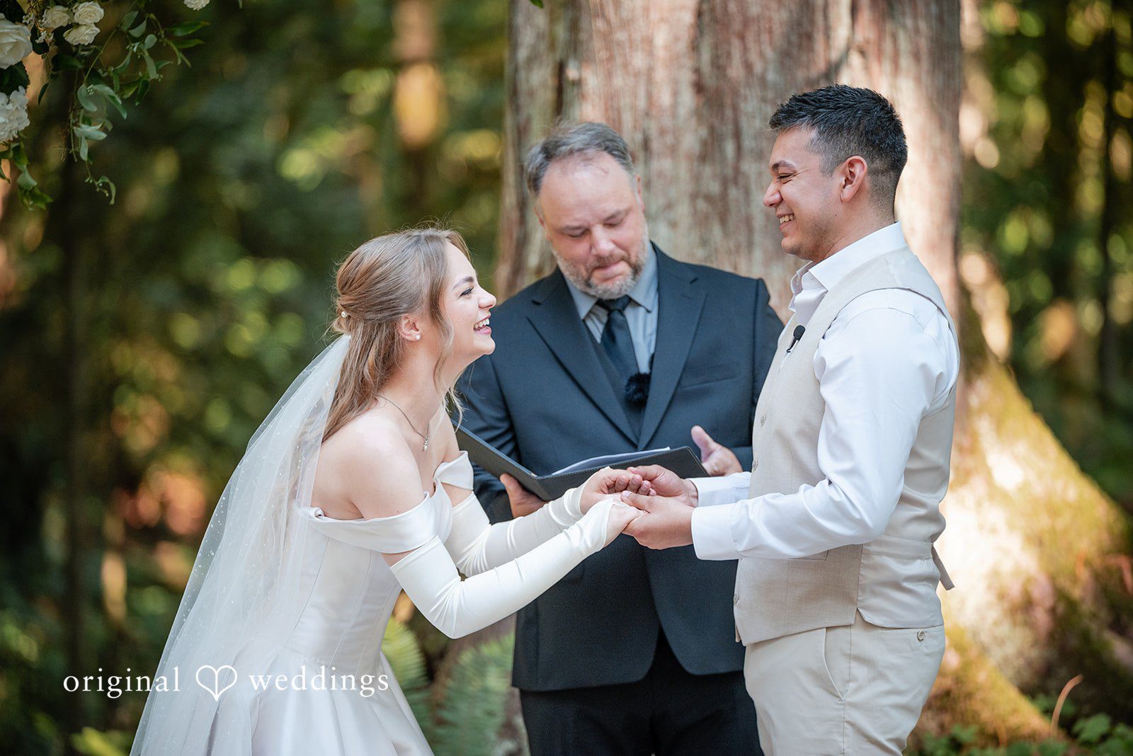 Kylie + Reymundo Kylie and Reymundo with the officiant during the ceremony