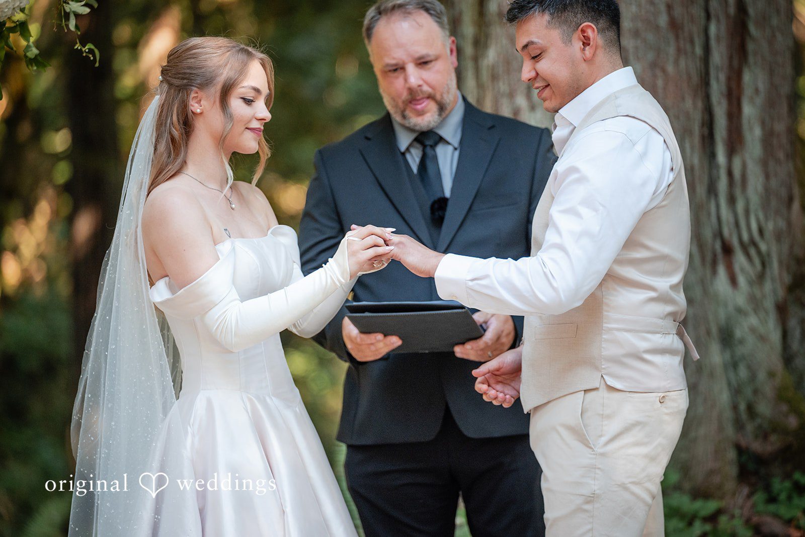 Kylie + Reymundo Couple exchanging vows at Victorian Vineyard