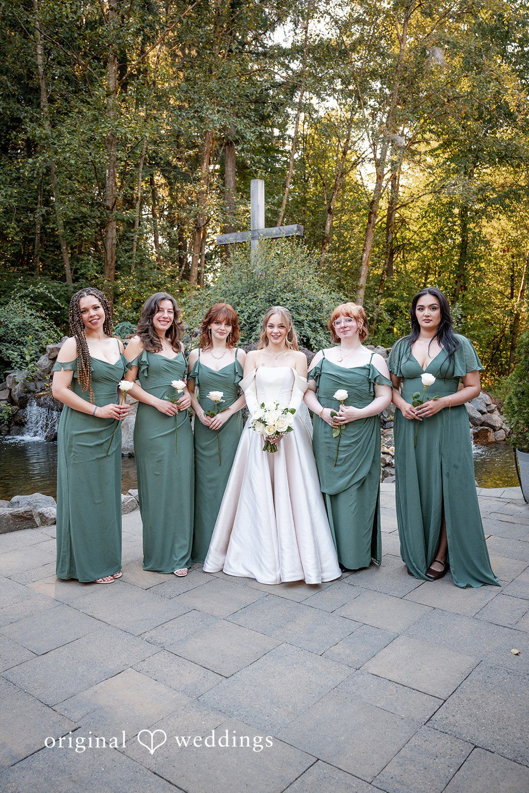Kylie + Reymundo Bride with her bridesmaids in green dresses