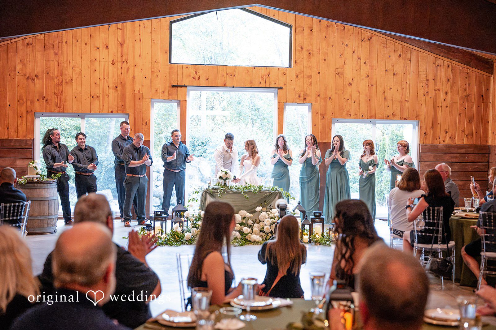 Kylie + Reymundo Guests gathered in the reception hall at Victorian Vineyard