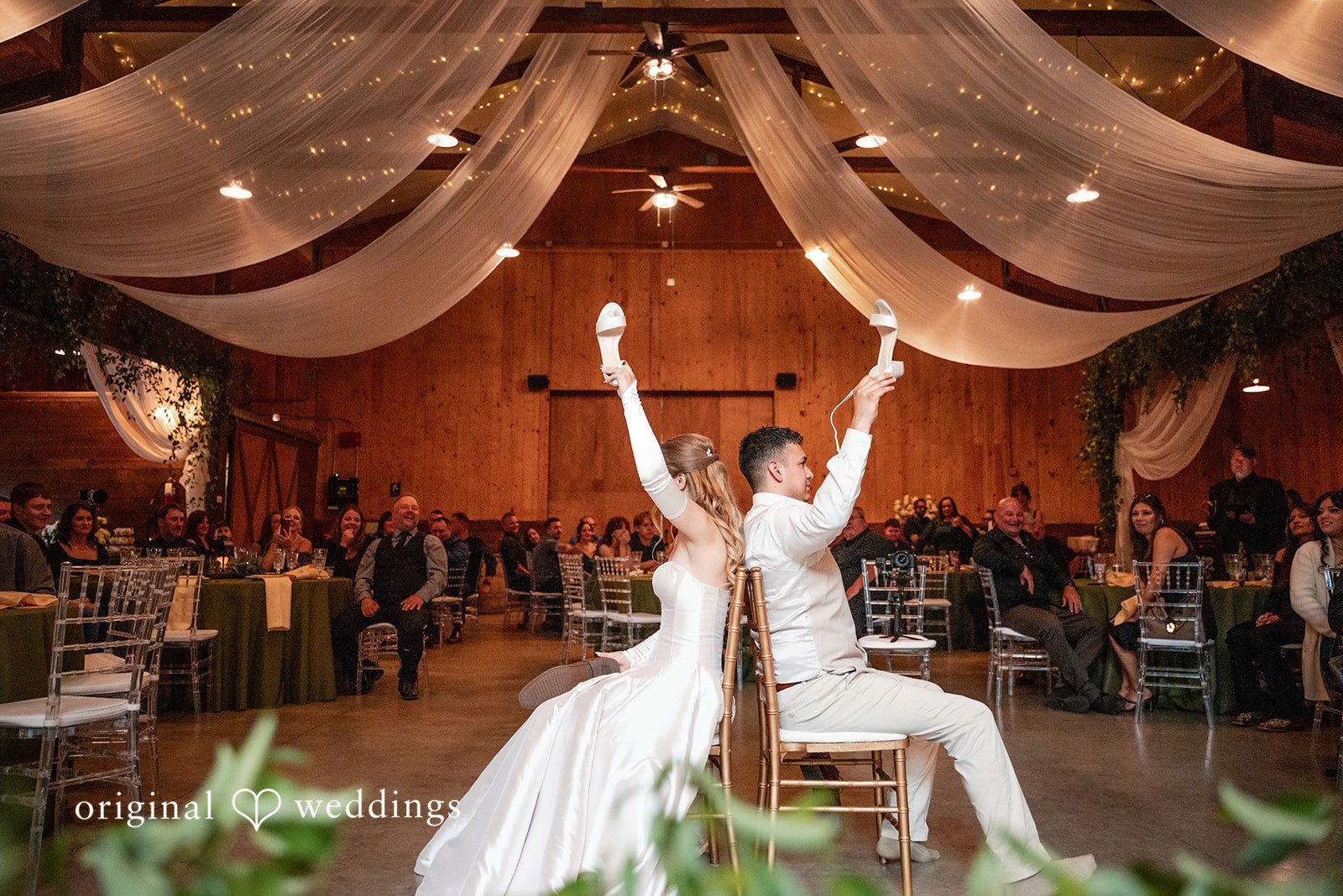 Kylie + Reymundo Bride dancing with her arm raised