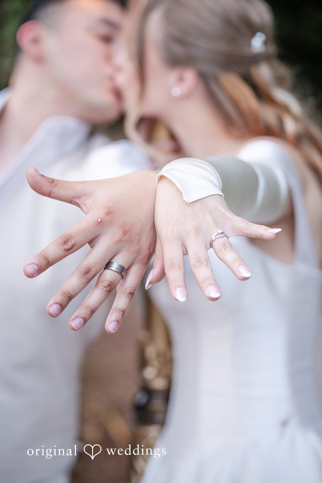 Kylie + Reymundo Close up of the couple's hands and rings