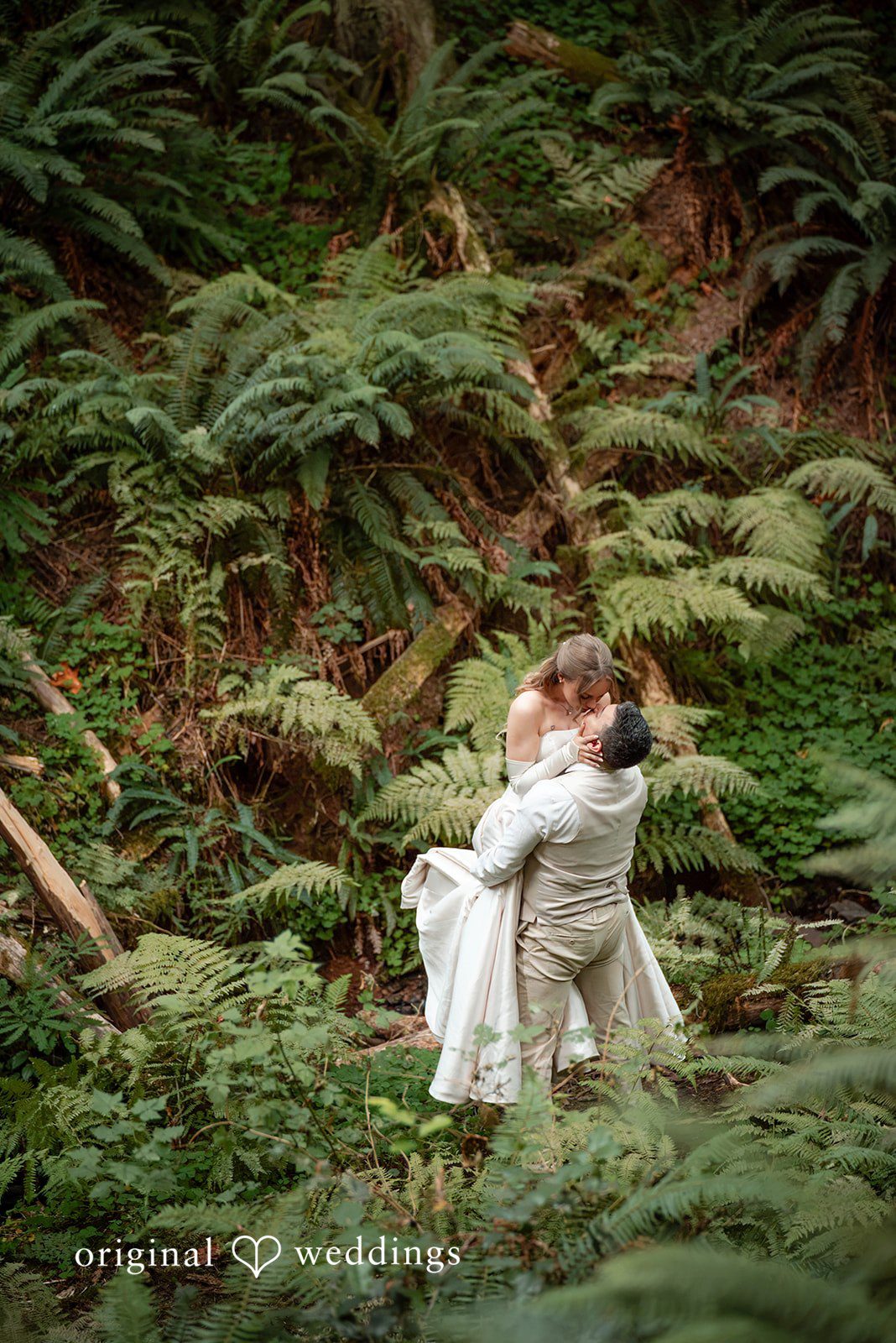 Kylie + Reymundo Bride and groom among the ferns