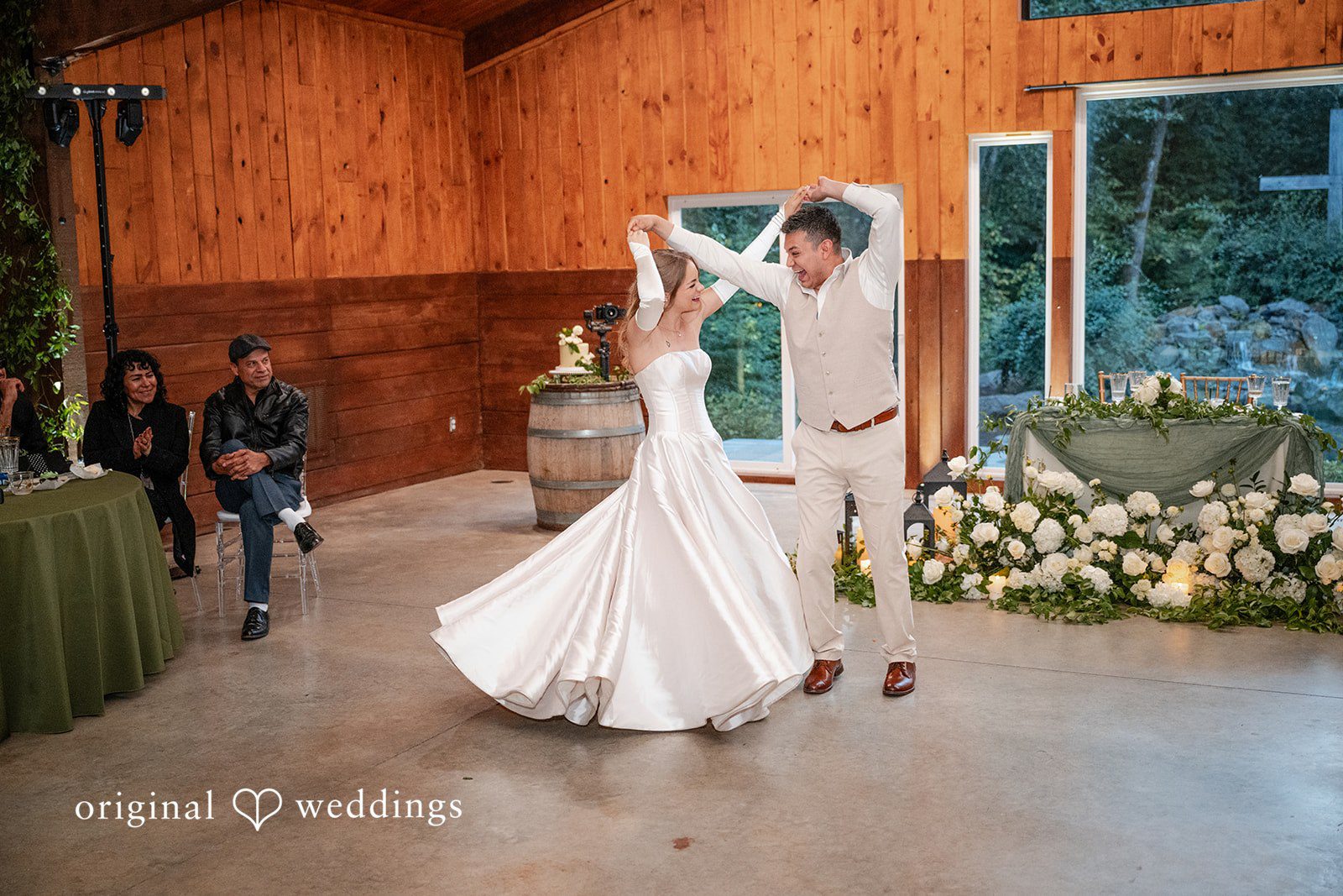 Kylie + Reymundo Couple dancing in the wood paneled hall