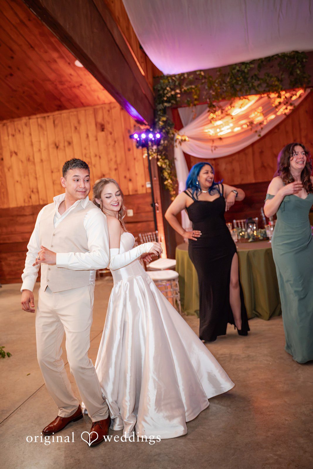 Kylie + Reymundo First dance under the draped ceiling