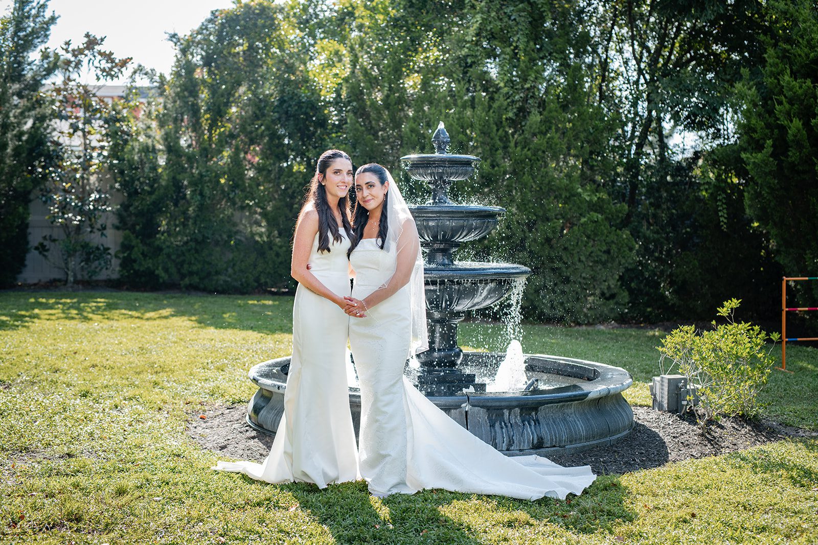 villa-festa-timeless-orlando-alondra-madison-024-05 Couple by the garden fountain at Villa Festa