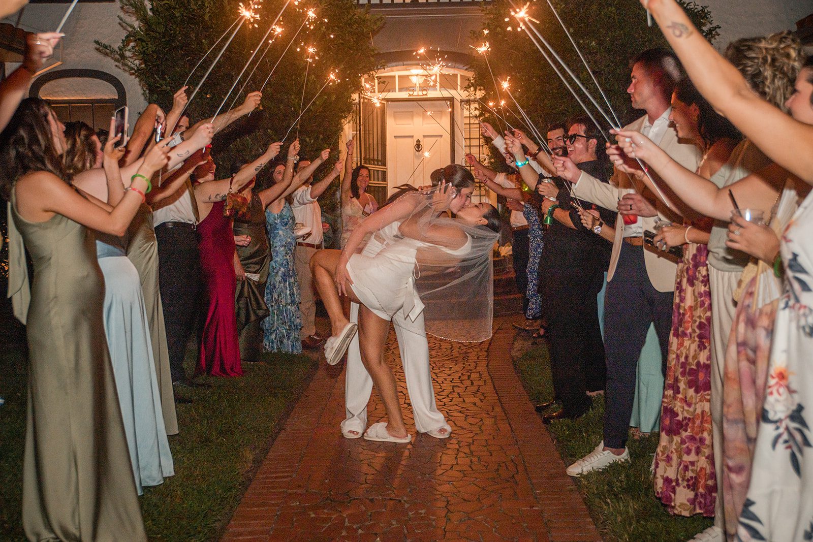 villa-festa-timeless-orlando-alondra-madison-035-04 Newlyweds dancing with guests at Villa Festa