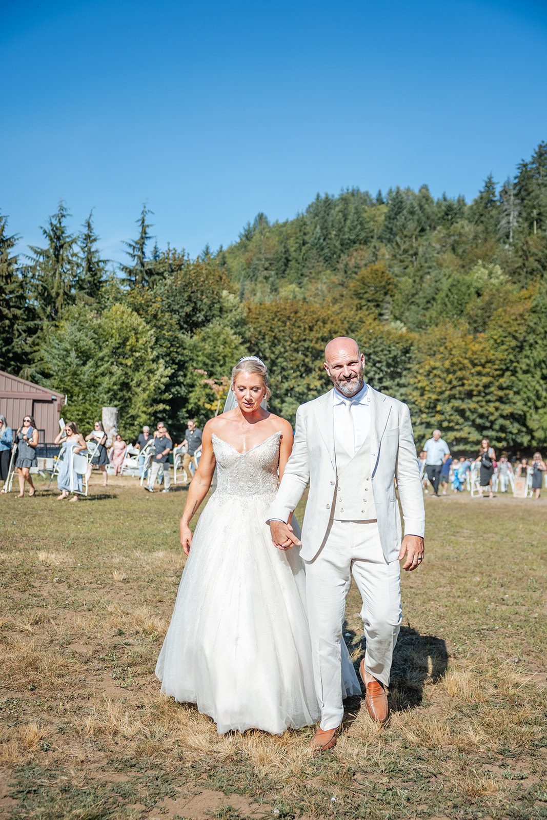 washington-backyard-timeless-seattle-beth-gunner-p019-23 Couple walking in the open field