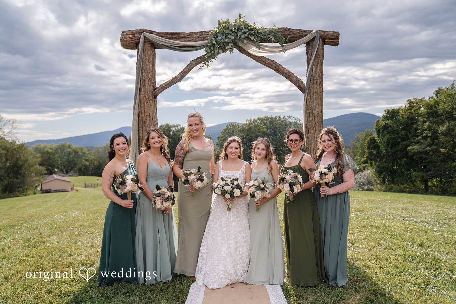 Shelby + Eli A beautiful portrait of the bride and her bridesmaids