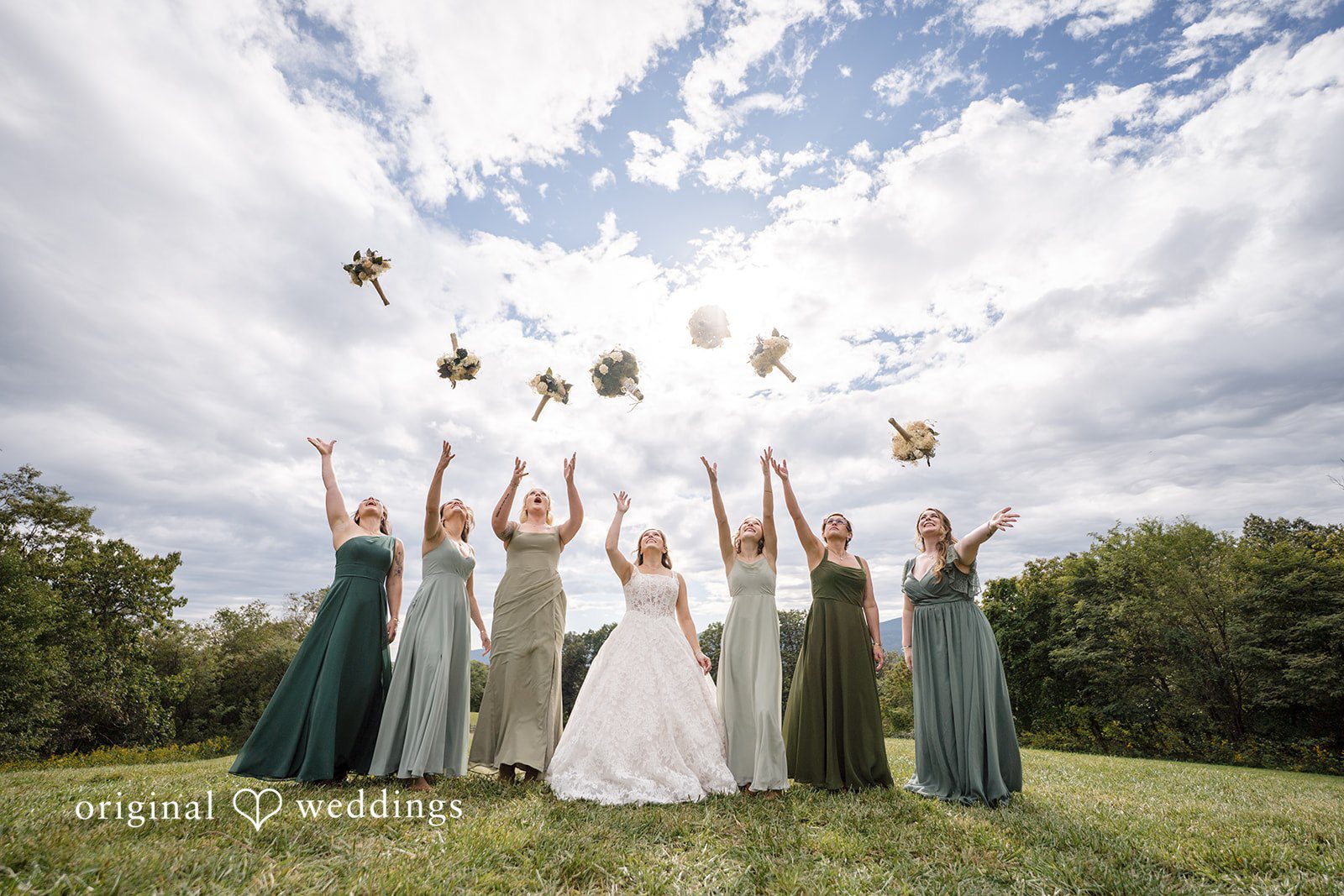 Shelby + Eli Bouquet tossed in the air