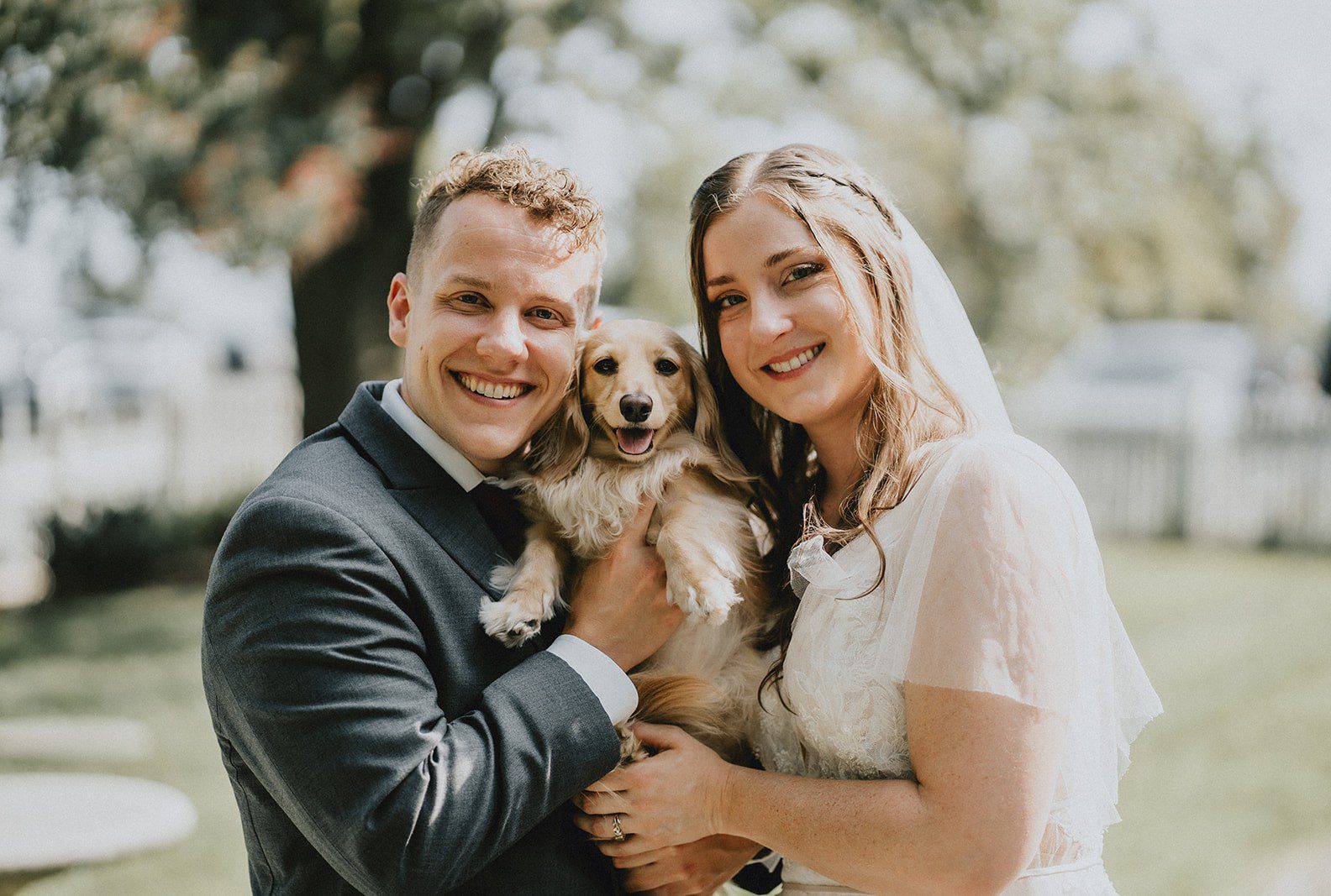 Bride and groom smiling together outdoors, captured by Washington DC wedding photographers from Original Weddings at Stone Tower Winery